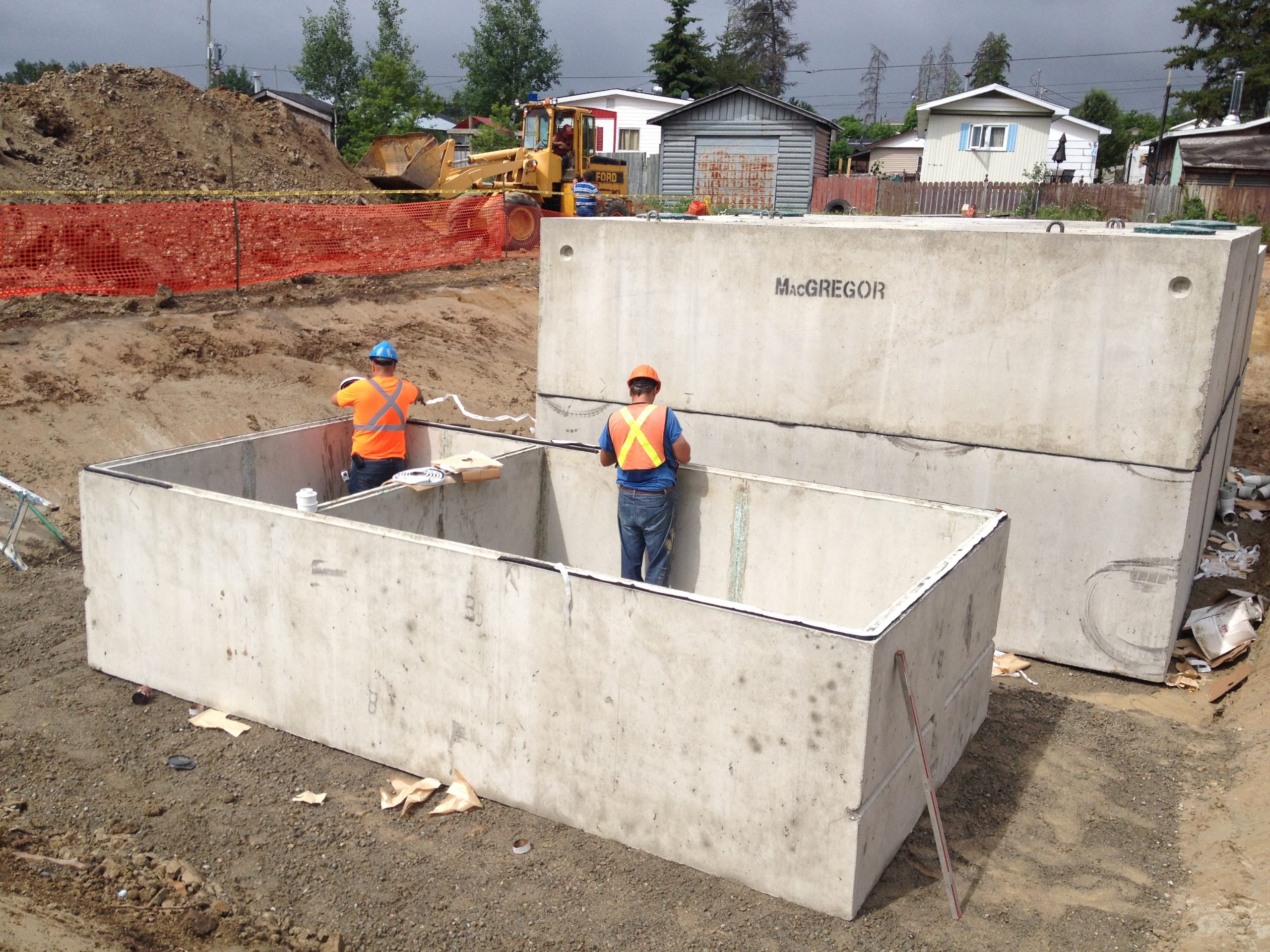 Installation of Concrete Septic Tanks & Flow Dividers by Contact Canadian Shield Consultants Agency